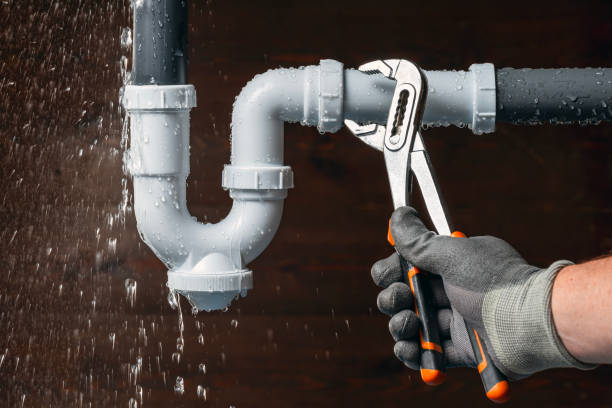 Professional Drain Cleaning technician working in Renton, WA
